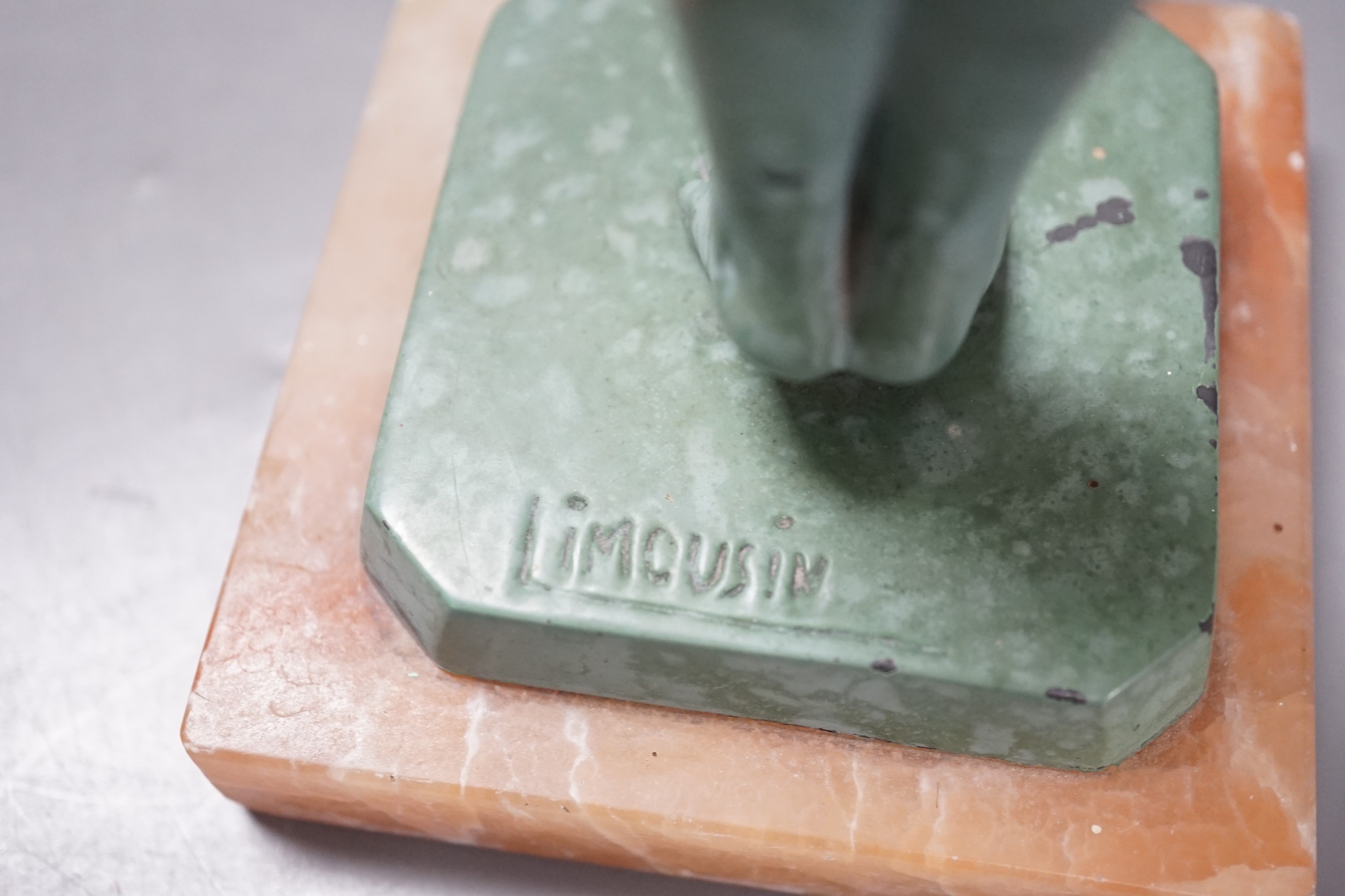 A pair of Art Deco bronzed metal figures stamped ‘Limousin’, 37cm